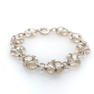 "silver kiss link bracelet" available at Artifex 