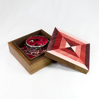 "Red Prism Box" available at Artifex
