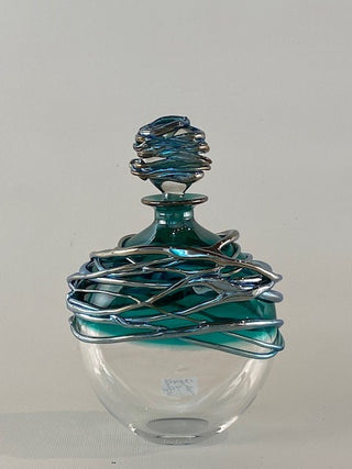 "Golden Trailing Perfume Bottle" available at Artifex 