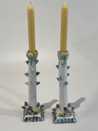 "A pair of thorn Candlestick holders" available at Artifex 