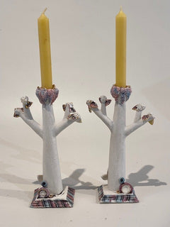 "A pair of thorn Candlestick holders" available at Artifex 