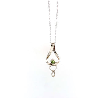 "Eternal wave peridot Necklace" available at Artifex 