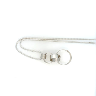 "Silver Interlink Knot Pendant" available at Artifex 