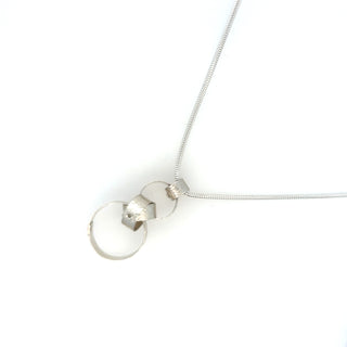 "Silver Interlink Knot Pendant" available at Artifex 