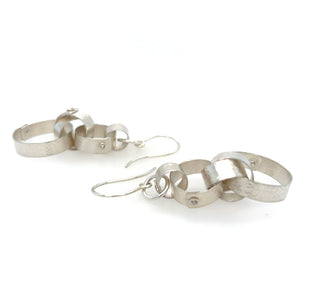 "Interlink Knot Earrings" available at Artifex 