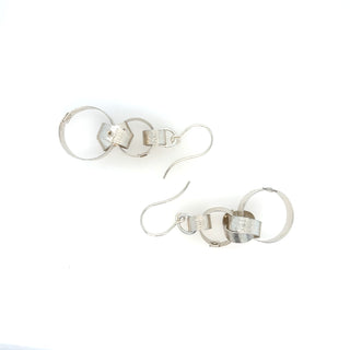 "Interlink Knot Earrings" available at Artifex 