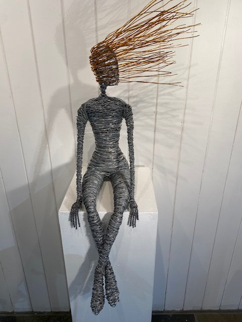"Sitting" available at Artifex 