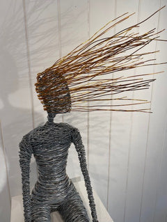 "Sitting" available at Artifex 