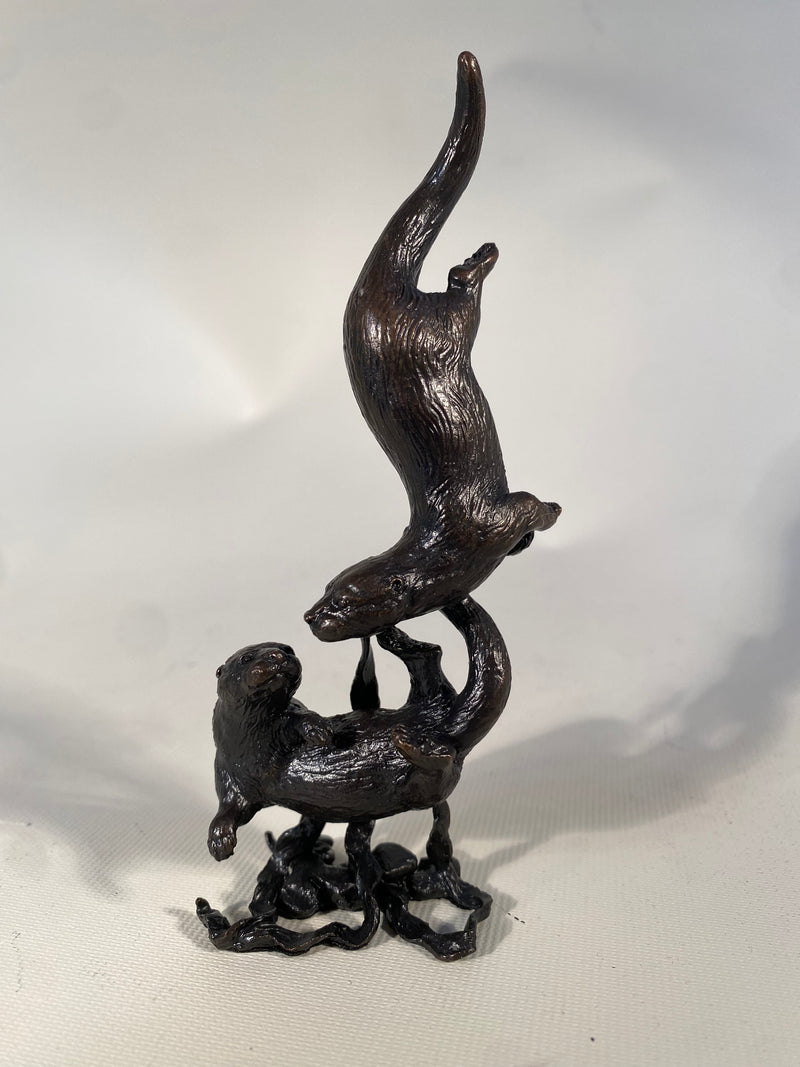 Bronze Otter Pair Playing