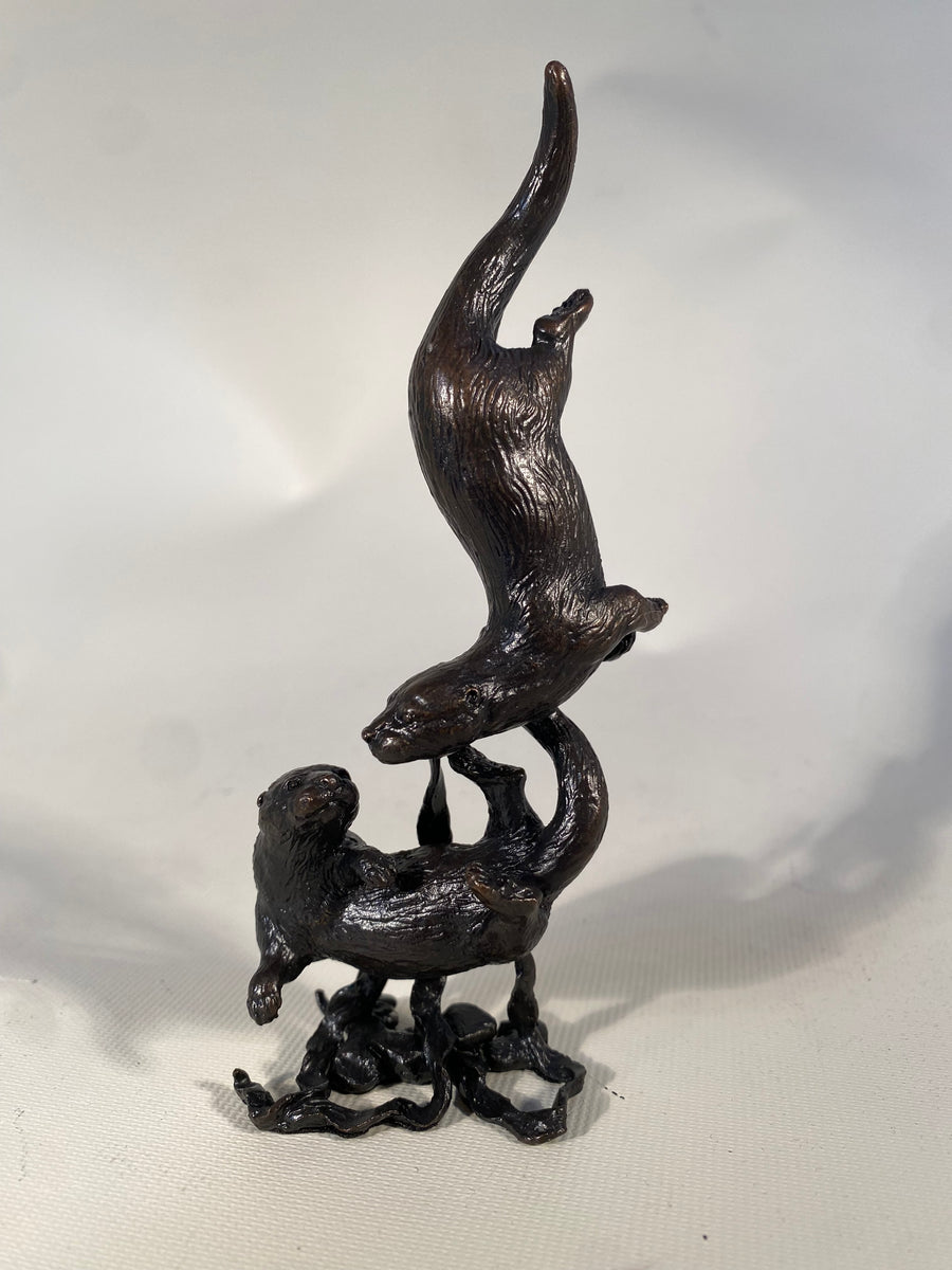 Bronze Otter Pair Playing