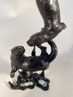 Bronze Otter Pair Playing