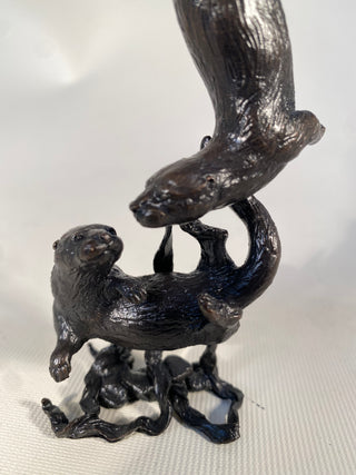 Bronze Otter Pair Playing
