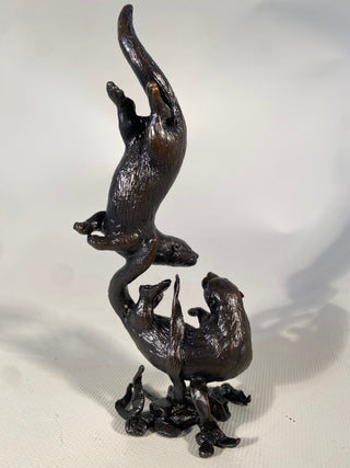 Bronze Otter Pair Playing