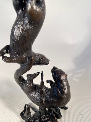 Bronze Otter Pair Playing