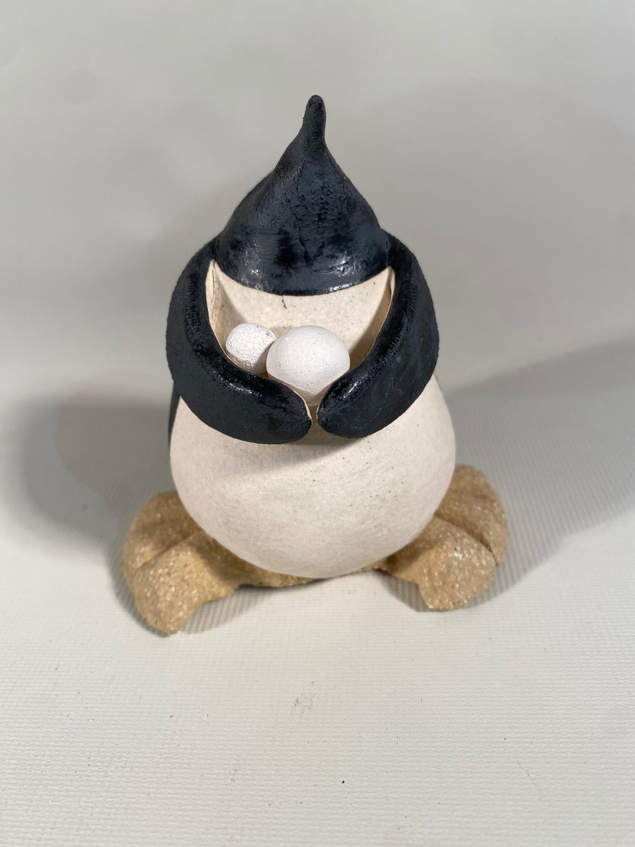 Penguin with Snowballs