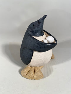 Penguin with Snowballs