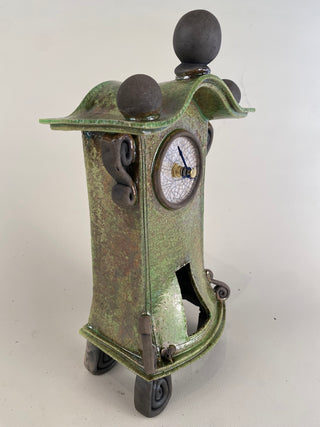 "Raku Clock with Pendulum" available at Artifex 