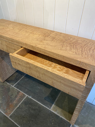 "Figured Tamu Console Table" available at Artifex 