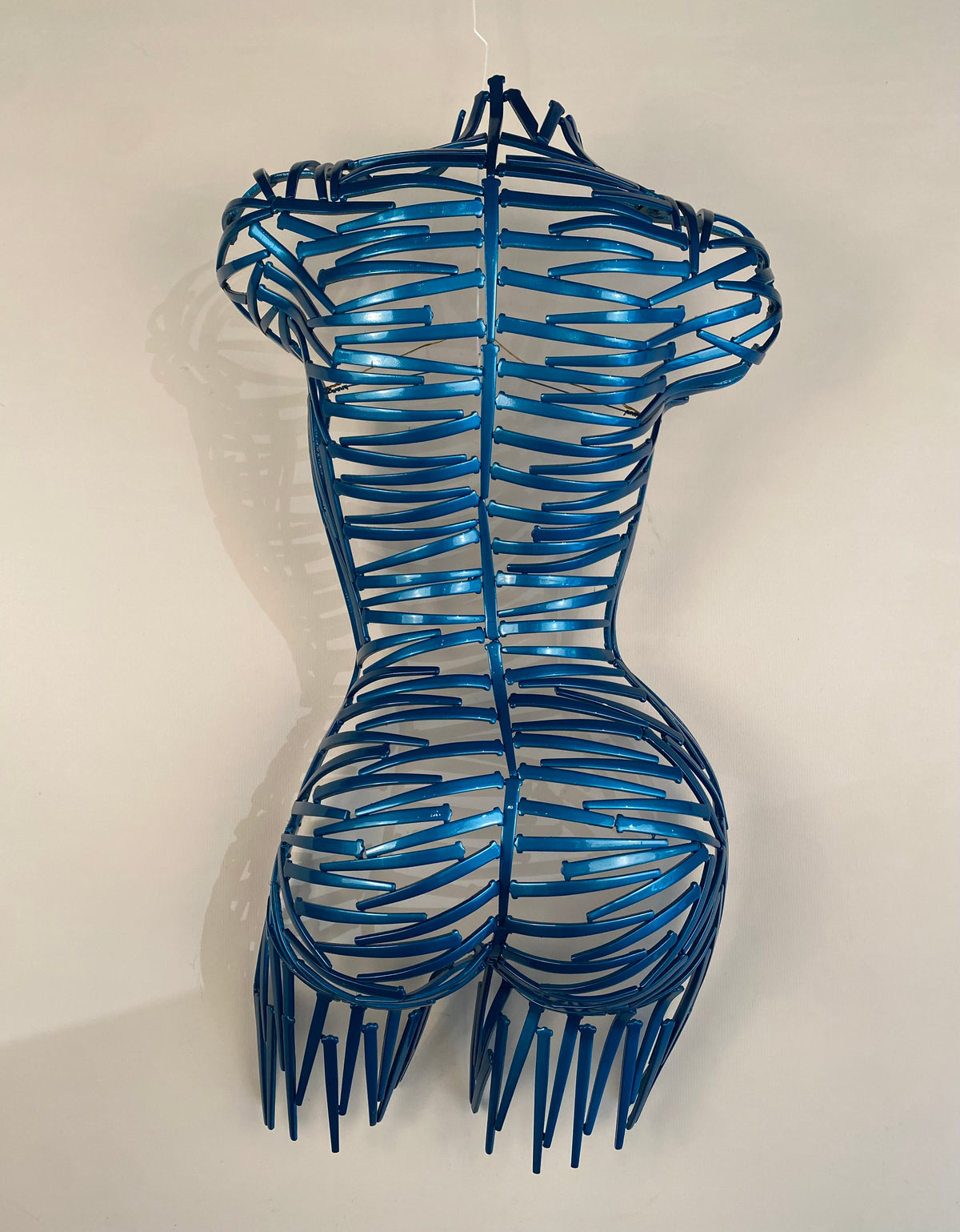 ""Nailed It" Wall hanging Torso Back in Mercedes Blue" available at Artifex 