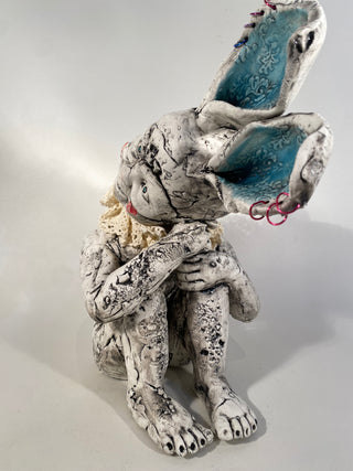 Sitting Child Big Blue Ears