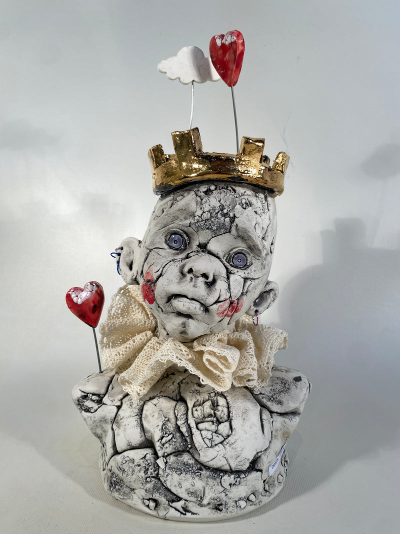 Child Bust with Gold Crown