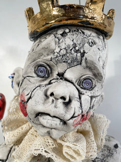 Child Bust with Gold Crown