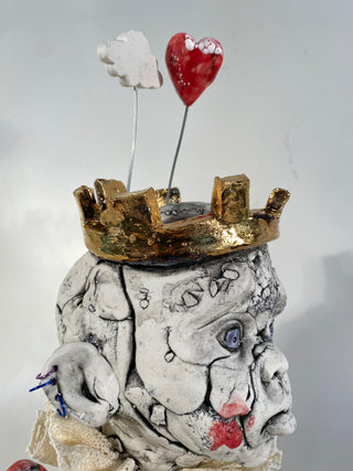 Child Bust with Gold Crown