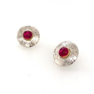 "Small round textured studs" available at Artifex 