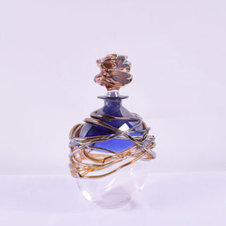 "Blue Golden Trailing Scent Bottle" available at Artifex 