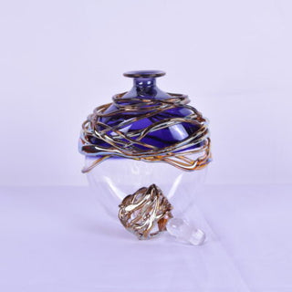 "Dark Blue Golden Trailing Perfume Bottle" available at Artifex 