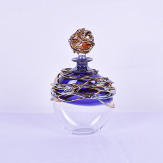 "Dark Blue Golden Trailing Perfume Bottle" available at Artifex 