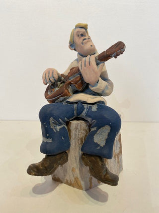 "Sitting Guitar" available at Artifex 